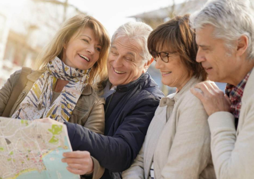 Elison Niles | Seniors happily looking at a map