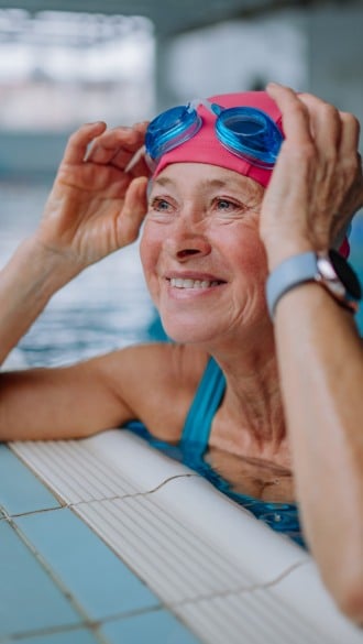 Elison Niles | Senior woman swimming in the pool